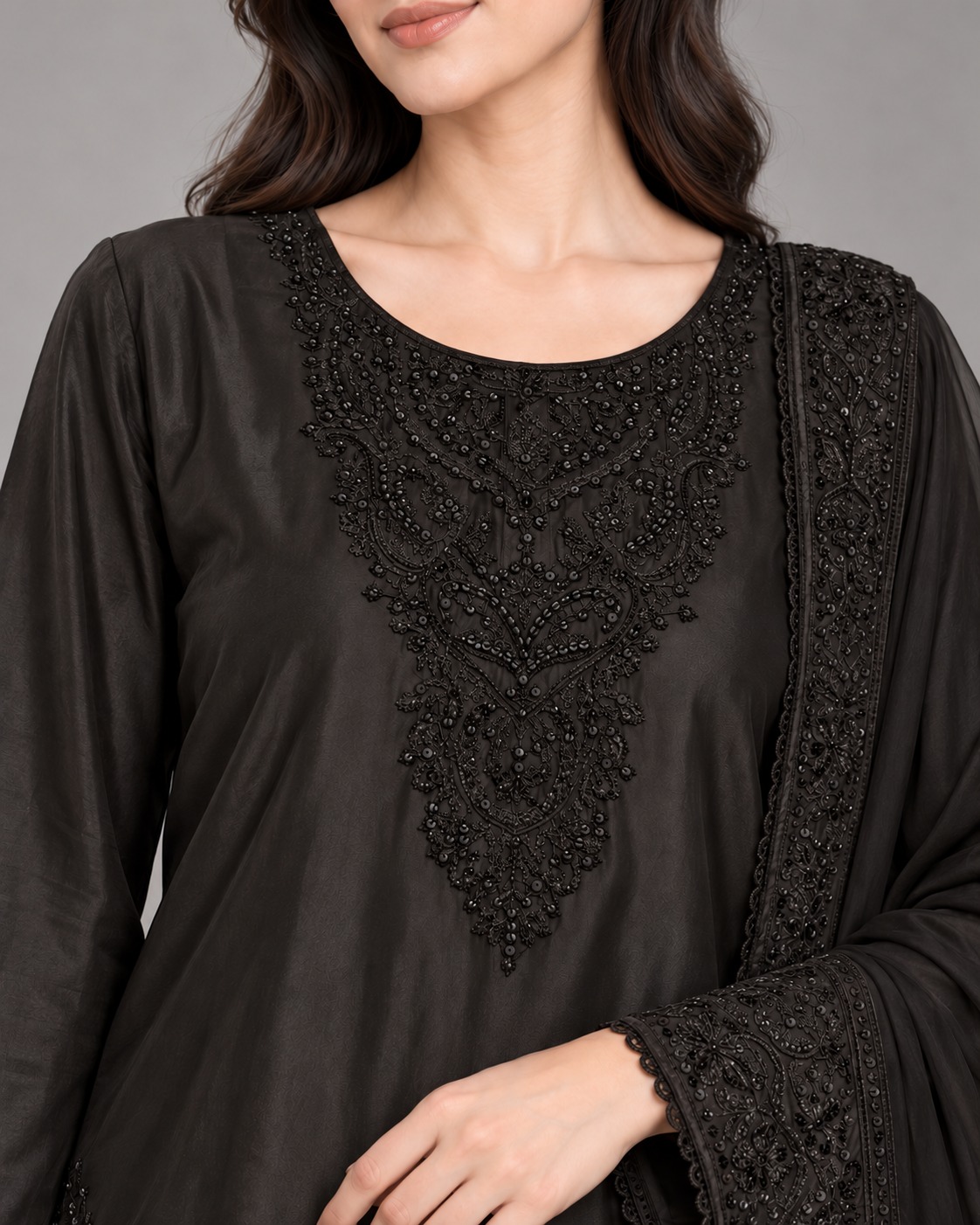 Black embroidered neckline and finishing details